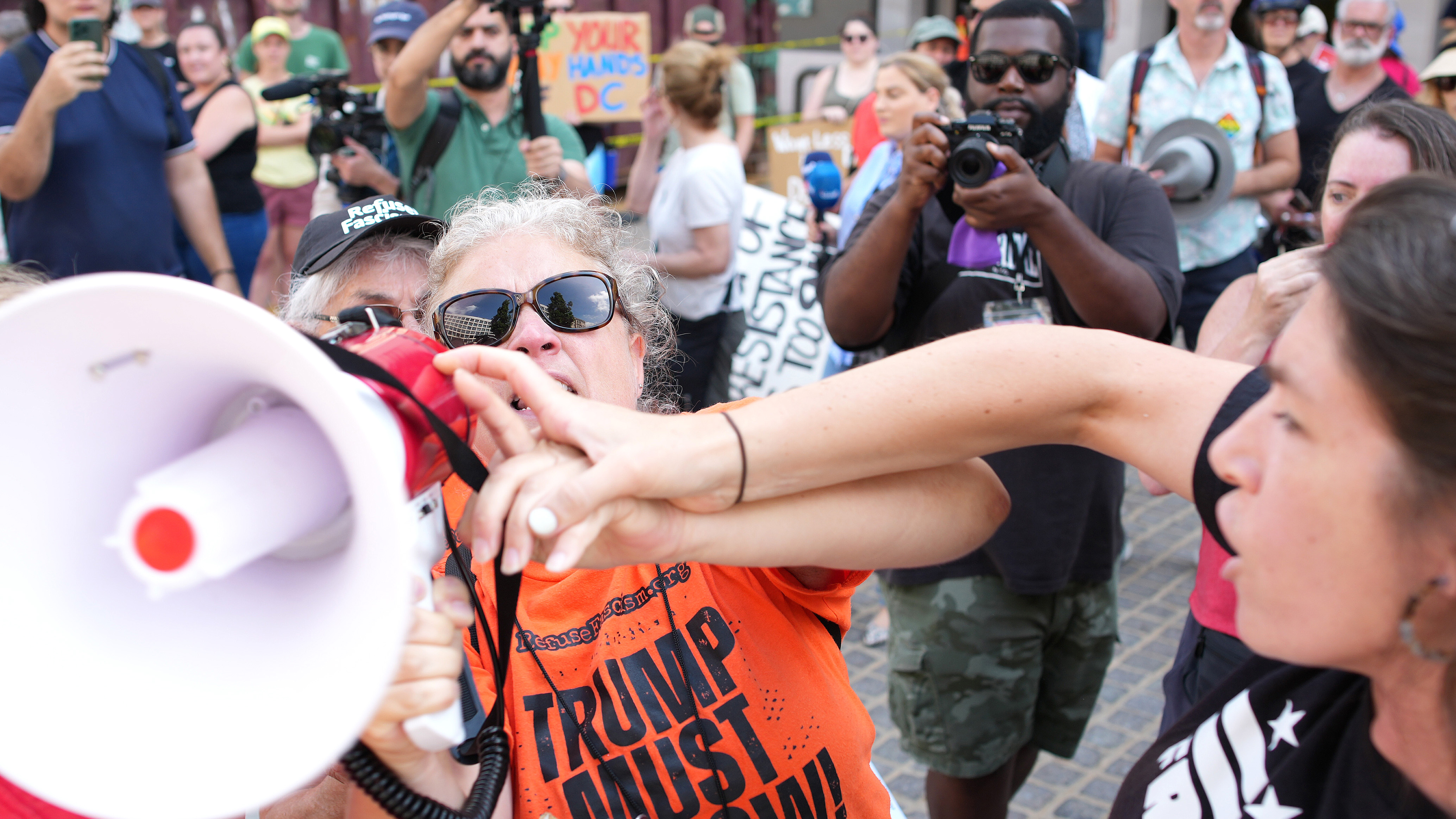 Photos: ‘Free DC’ protesters rally against Trump’s takeover of DC ...