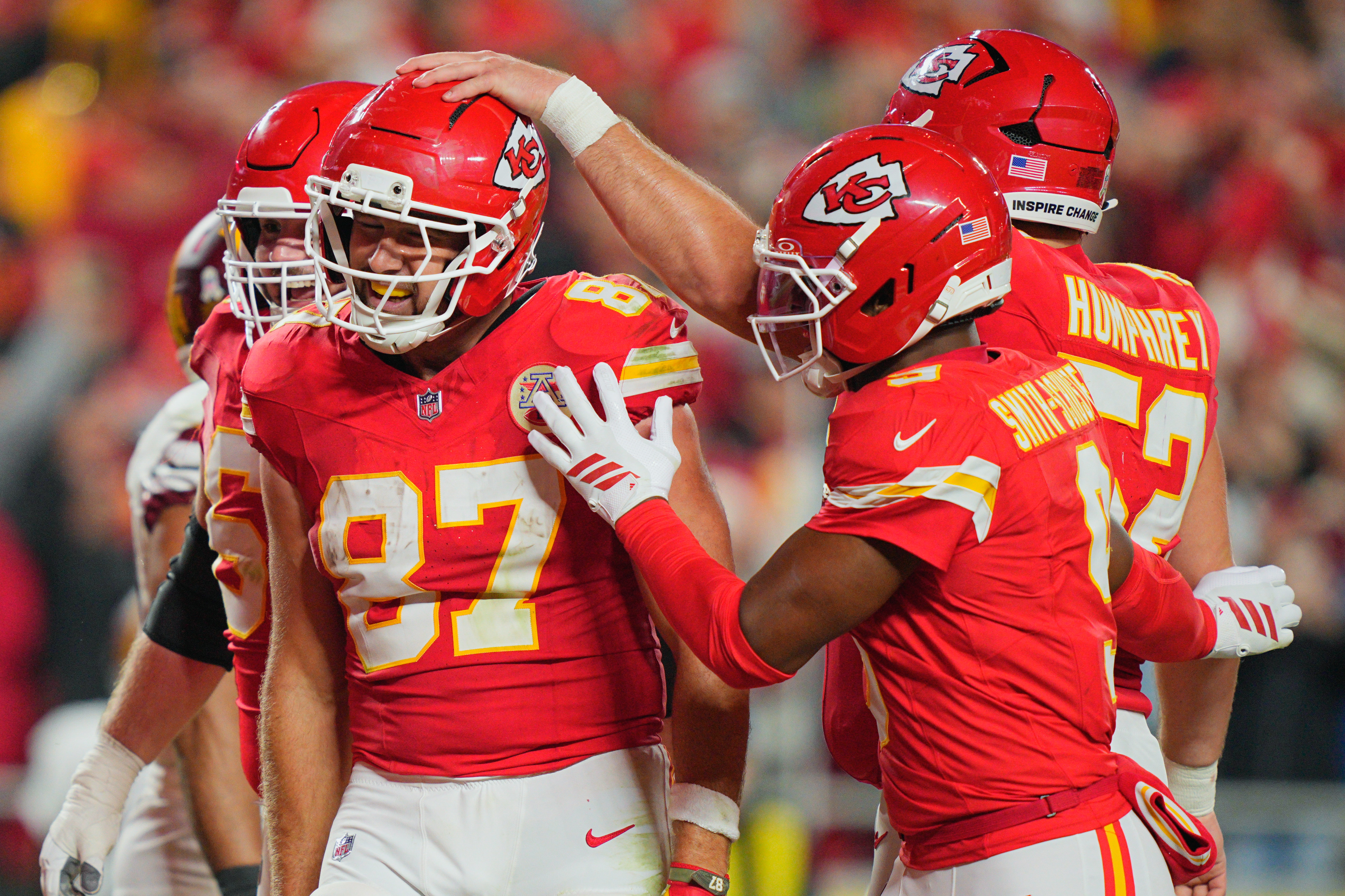 Kansas City Chiefs tight end Travis Kelce (87) celebrates after scoring a touchdown against the Washington Commanders during the third quarter of the game at GEHA Field at Arrowhead Stadium.