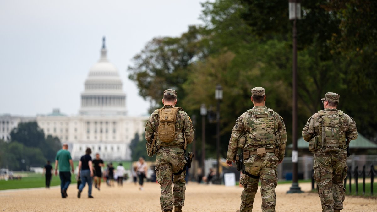 DC reaches court settlement with man detained while protesting troops' patrol with Dar...