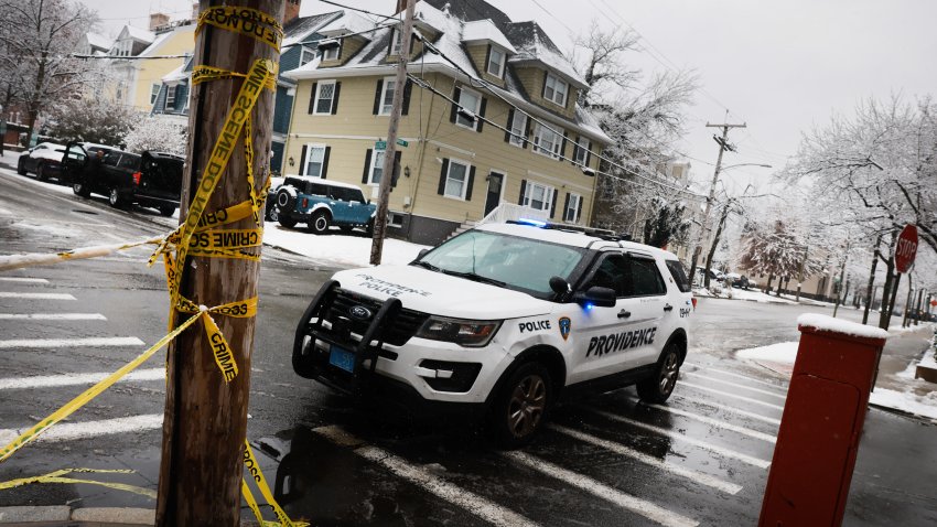 PROVIDENCE, RHODE ISLAND – DECEMBER 14: Police patrol  Brown University following a mass shooting yesterday that left at least two people dead and nine others injured on December 14, 2025 in Providence, Rhode Island. A suspect in the shooting was detained overnight at a hotel in a nearby community following a manhunt across the prestigious university and the greater Providence area. The shooting took place around 4 p.m. on Saturday as students were preparing for exams and the holiday break. (Photo by Spencer Platt/Getty Images)
