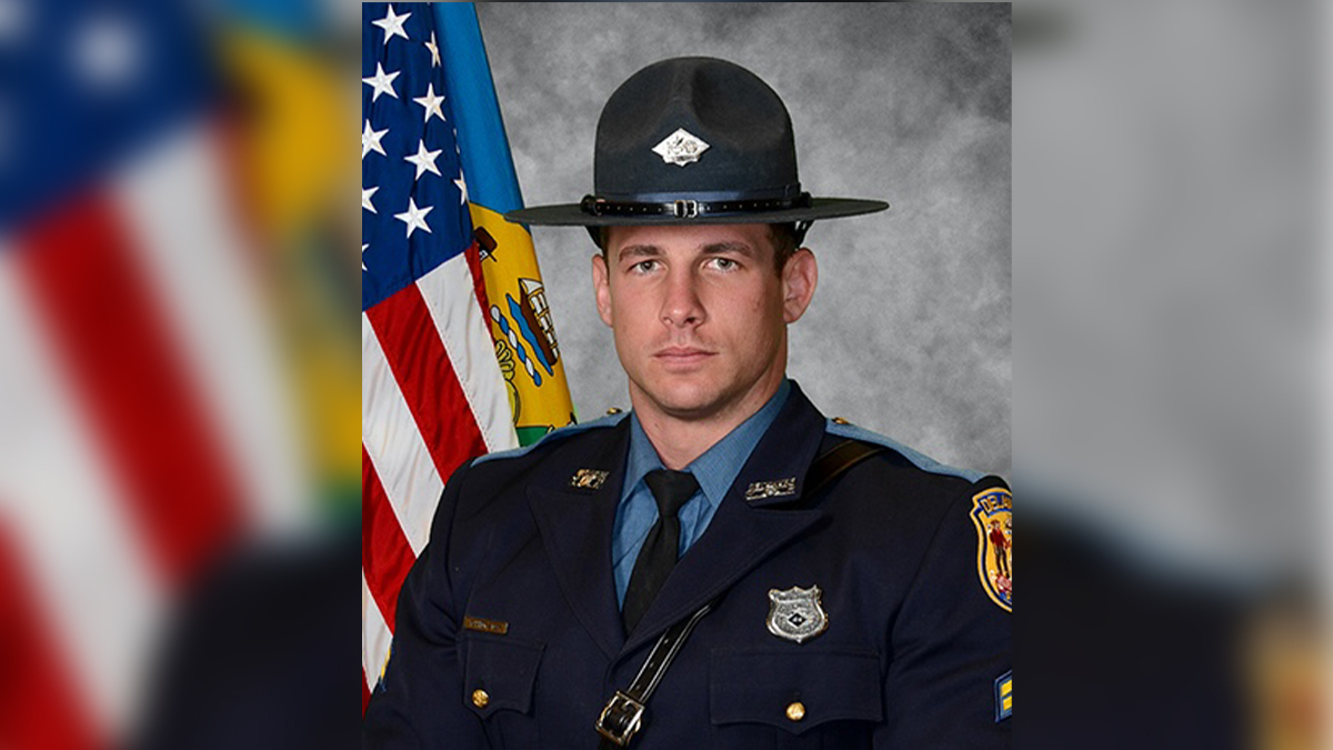 Delaware officials lauded the heroic actions of a state trooper who was killed in a shooting at a Department of Motor Vehicles location in Wilmington.