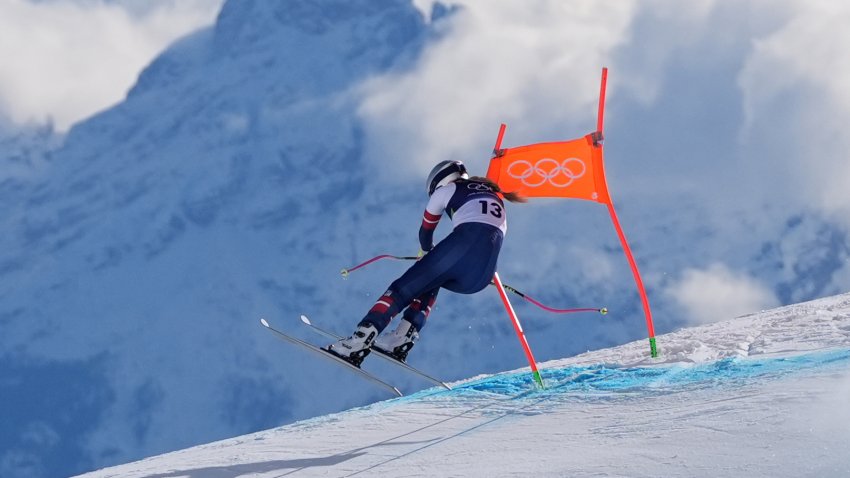 United States’ Lindsey Vonn crashes into a gate during an alpine ski women’s downhill race, at the 2026 Winter Olympics, in Cortina d’Ampezzo, Italy, Sunday, Feb. 8, 2026. (AP Photo/Jacquelyn Martin)