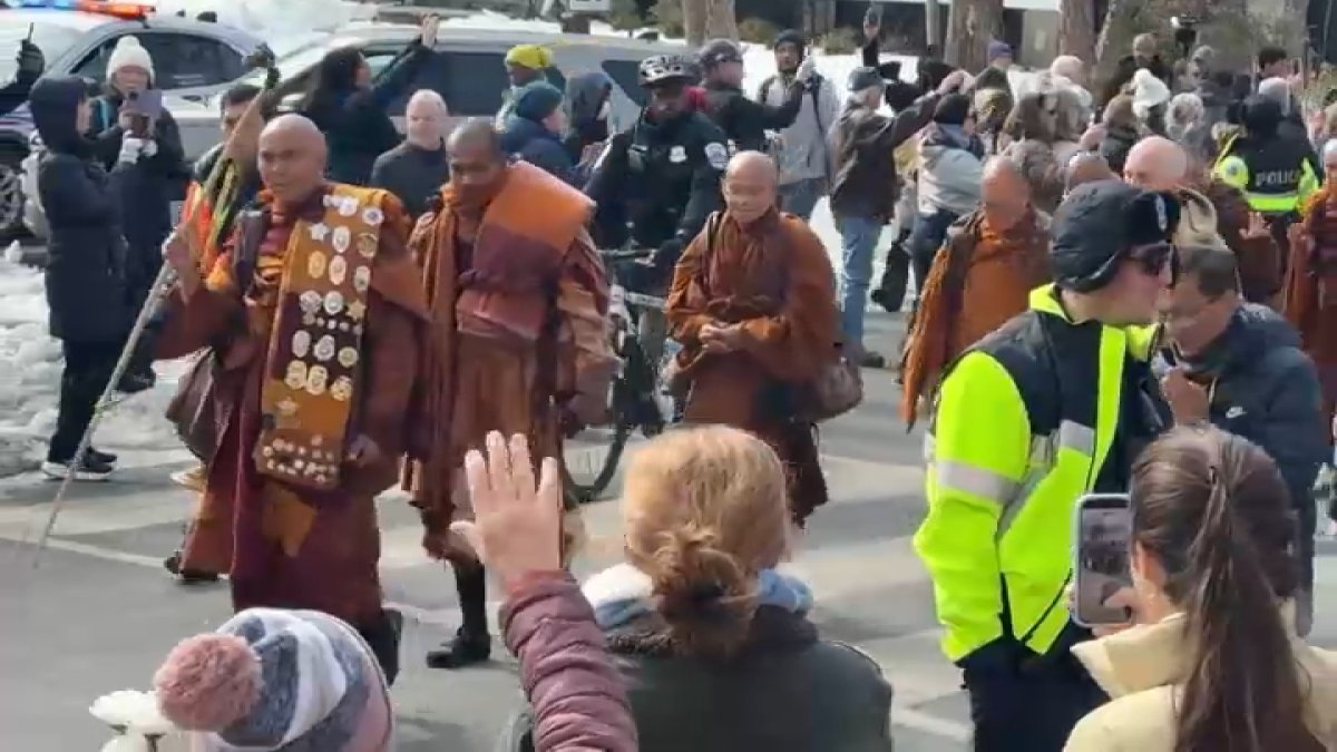 Buddhist monks walk to U.S. Capitol on final day of 15-week journey from Texas