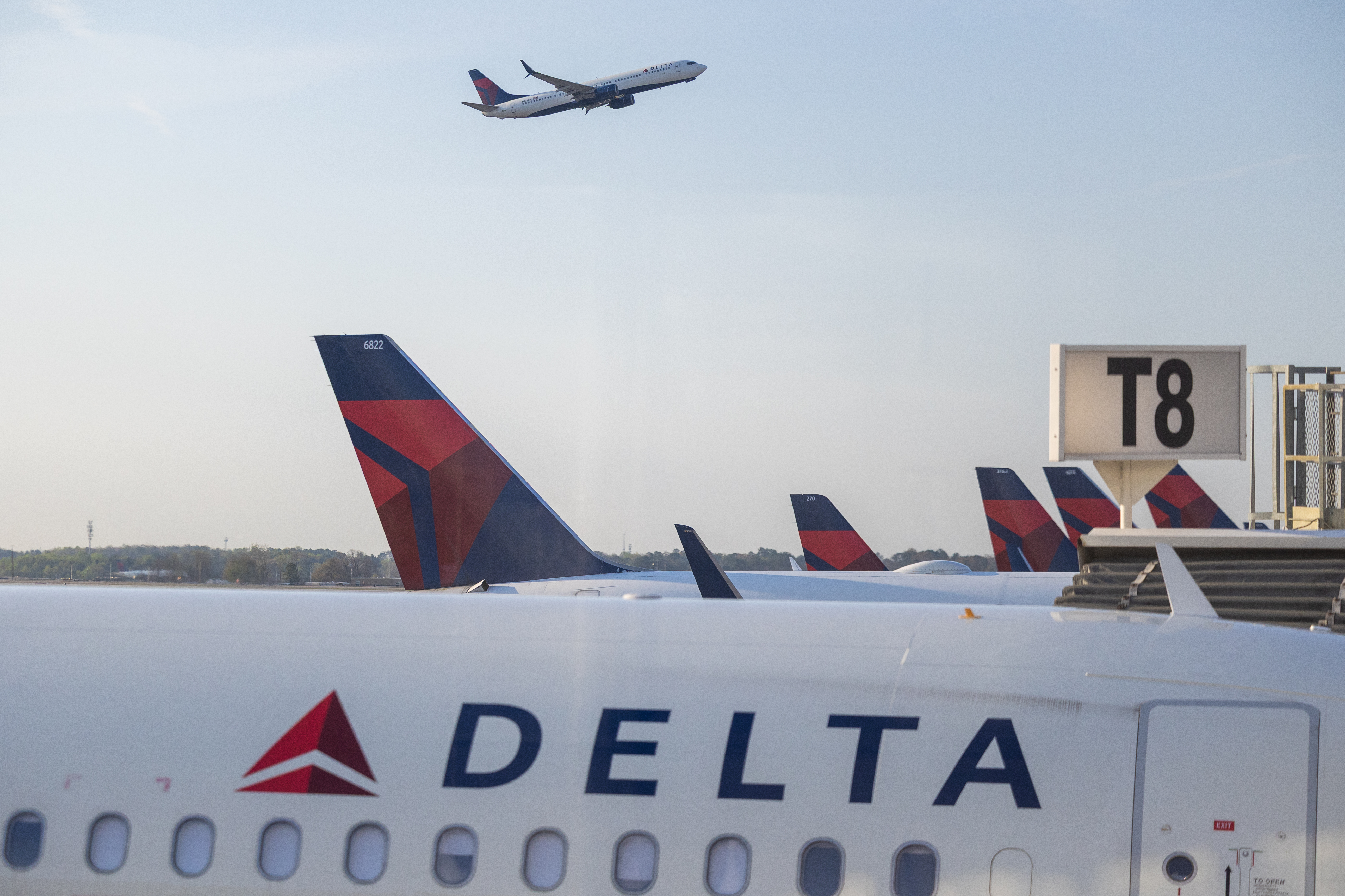 Delta Airlines planes are seen at Hartsfield-Jackson Atlanta International Airport in Atlanta, Georgia on March 23, 2026.