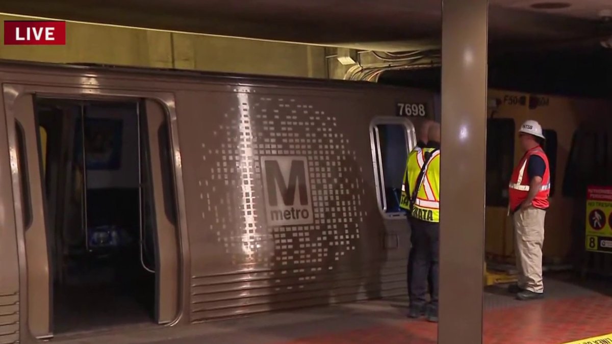 11 hurt after Metro work vehicle hits stopped train at Metro Center station