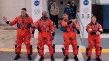 From left to right: Mission specialist Jeremy Hansen of CSA, pilot Victor Glover, commander Reid Wiseman and mission specialist Christina Koch walk out ahead of the launch on April 1.