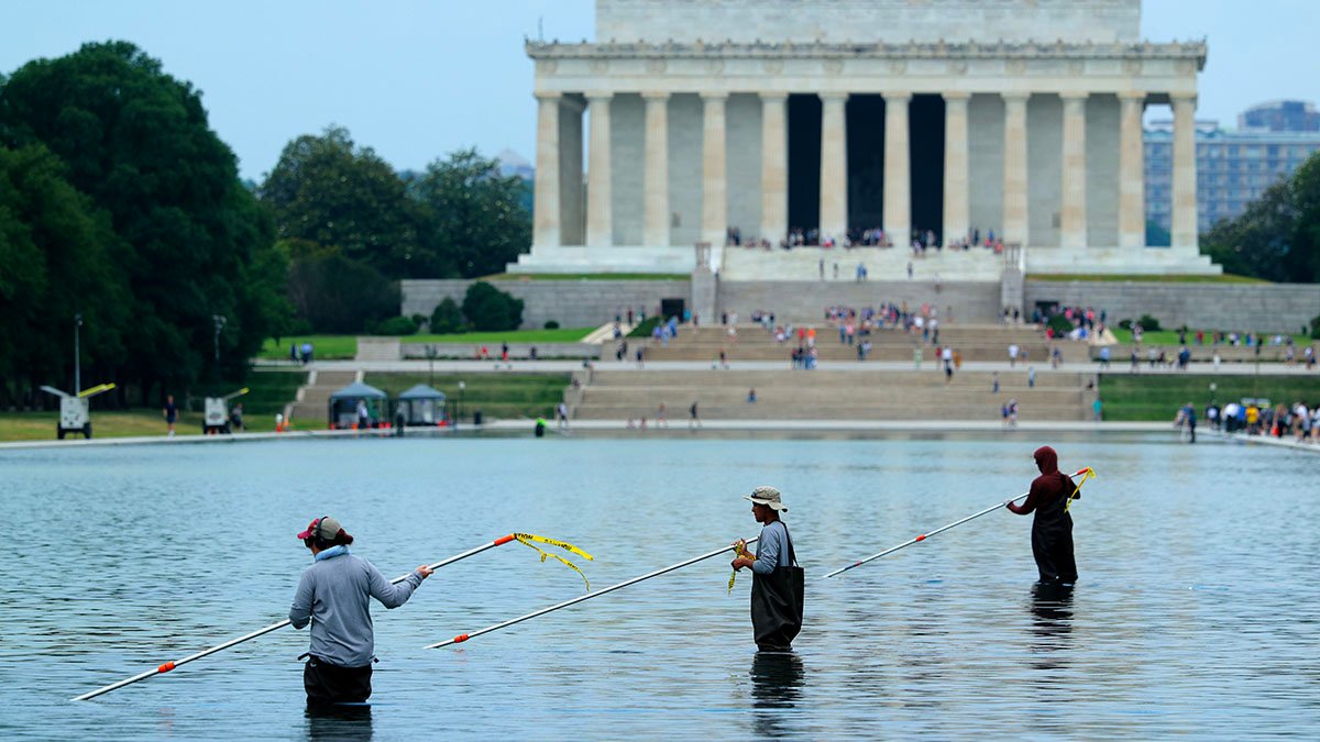 Blue paint seen chipping off Lincoln Memorial Reflecting Pool