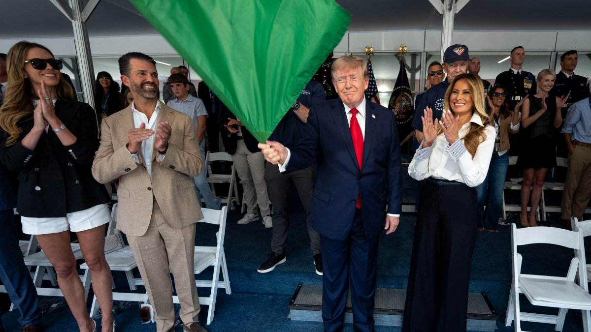 Trump waves the green flag to start the IndyCar race as drivers zoom through Washington's streets