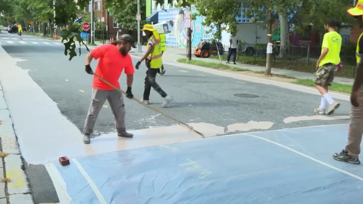 DC painting special coating on roads in hopes of cooling ‘urban heat islands'
