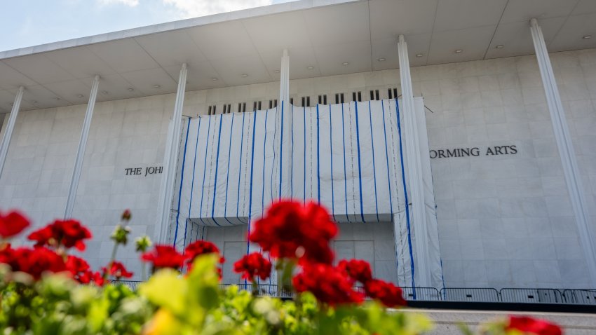 A tarp covers the facade of the Kennedy Center in Washington, DC, US, on Friday, Aug. 28, 2026. The Kennedy Center board agreed to postpone plans to add President Donald Trump’s name back onto the decades-old performing arts venue, hours after a federal judge indicated he needed more time to consider a challenge to the move. Photographer: Daniel Heuer/Bloomberg via Getty Images