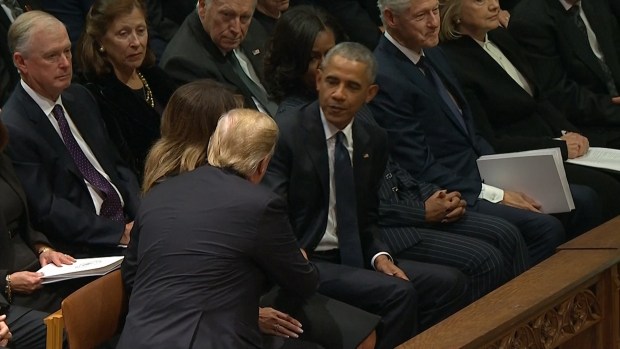 Trumps, Obamas Shake Hands at Bush Funeral